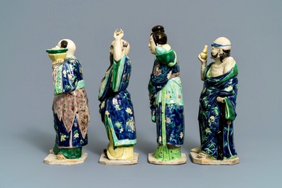 A Chinese 'Eight Immortals' set of enamelled biscuit figures, Republic, 20th C.