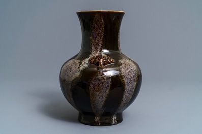 A Chinese brown flamb&eacute;-glazed hu vase, Kangxi mark, 19th C.