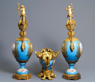 A pair of massive gilt bronze-mounted S&egrave;vres porcelain ewers and a jardini&egrave;re, France, 19th C.