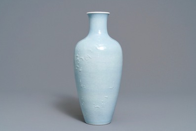 A Chinese monochrome lavender-blue vase with underglaze design, Yongzheng mark, 19th C.