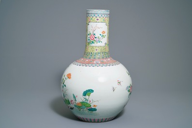 A Chinese famille rose tianqiu ping vase with birds among foliage, Qianlong mark, 20th C.