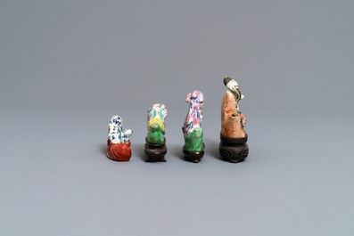 Three Chinese famille rose water droppers and a brush rest, 18/19th C.