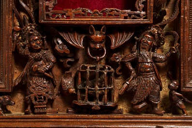 Two Chinese carved wood frames with dragons and figures, ca. 1900