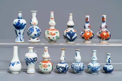 Thirteen Chinese blue and white and famille verte miniature vases, Kangxi and later