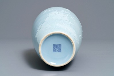 A Chinese monochrome lavender-blue vase with underglaze design, Yongzheng mark, 19th C.