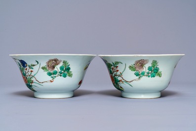 A pair of Chinese famille verte 'peacock among blossoms' bowls, Kangxi