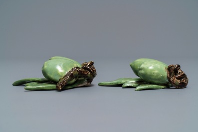 Two pairs of polychrome Dutch Delft models of olives, 18th C.