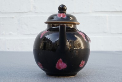 A small Chinese famille rose black-ground teapot and cover, Yongzheng/Qianlong