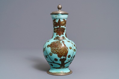 A German pewter-mounted turquoise ground ewer with birds among flowers, 17/18th C.