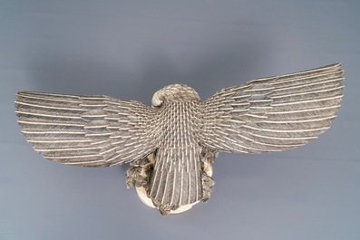 A Chinese carved ivory model of an eagle with a snake, ca. 1930