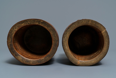 Two Chinese carved bamboo brush pots and five wooden stands, 19/20th C.
