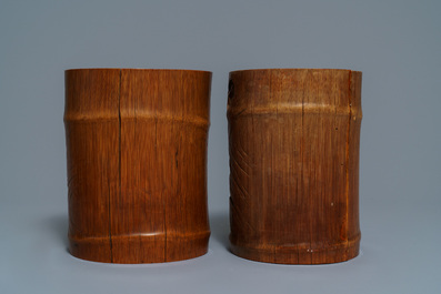 Two Chinese carved bamboo brush pots and five wooden stands, 19/20th C.