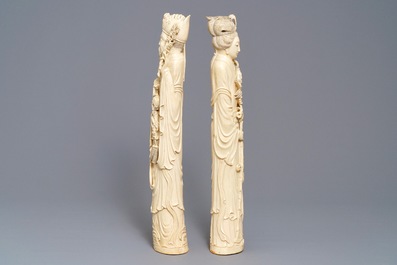 A pair of tall Chinese ivory figures, 19th C.