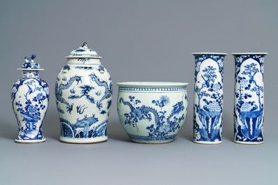 Four Chinese blue and white vases and a jardini&egrave;re, 19th C.