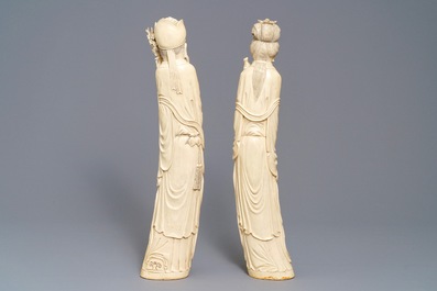 A pair of tall Chinese ivory figures, 19th C.