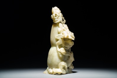 A Chinese pale green jade 'immortals' vase, 20th C.