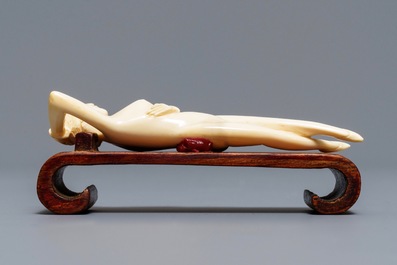 A Chinese ivory model of a doctor's lady, 19th C.