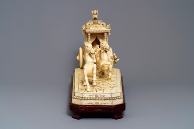 Un groupe de taille exceptionelle en ivoire sculpt&eacute; figurant une carrosse aux chevaux, Chine, 19/20&egrave;me
