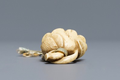 A Japanese ivory 'lotus flower' netsuke, Edo, 18th