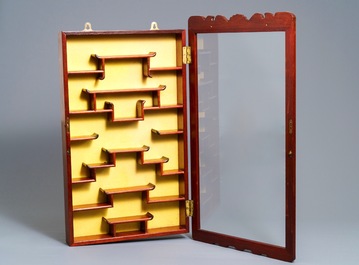 Two Chinese wooden wall hanging displays for snuff bottles and miniatures, 20th C.