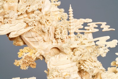 A fine Chinese ivory landscape with a puzzle ball, Canton, ca. 1920