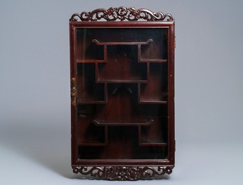 Two Chinese wooden wall hanging displays for snuff bottles and miniatures, 20th C.