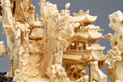 A fine Chinese ivory landscape with a puzzle ball, Canton, ca. 1920