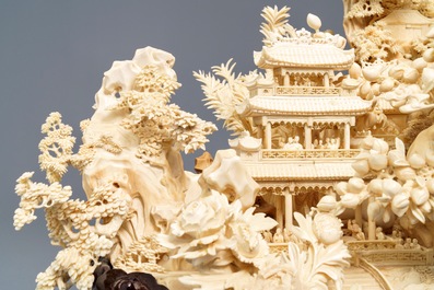 A fine Chinese ivory landscape with a puzzle ball, Canton, ca. 1920