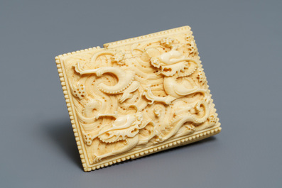 A Chinese ivory 'dragon' belt buckle, Wanli
