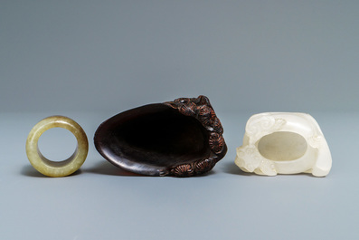 A Chinese jade archer's ring, a horn libation cup and a Beijing glass brush washer, 18th C. and later