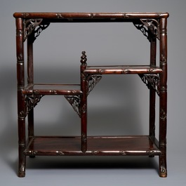 A Chinese carved wood display, 19/20th C.