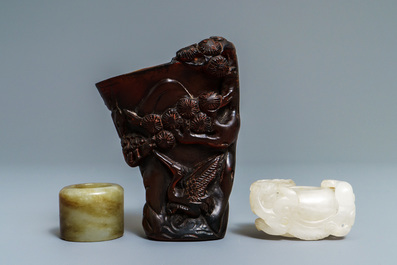 A Chinese jade archer's ring, a horn libation cup and a Beijing glass brush washer, 18th C. and later