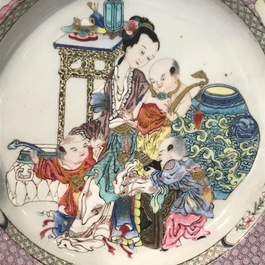 A fine Chinese famille rose 'ruby back' eggshell plate with a lady with three boys, Yongzheng