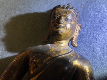 A gilt bronze figure of Buddha Shakyamuni, Tibet, 14/15th C.