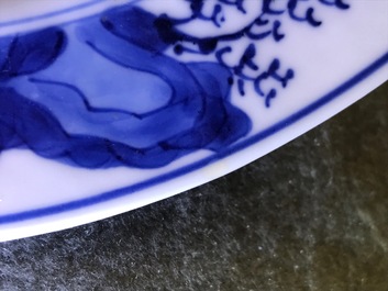 Two Chinese blue and white and famille verte 'Eight horses of Wang Mu' plates, Kangxi