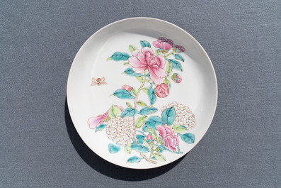 A fine Chinese famille rose 'ruby back' eggshell plate with floral design, Yongzheng