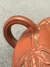 A Chinese Yixing stoneware flower-shaped teapot, Kangxi