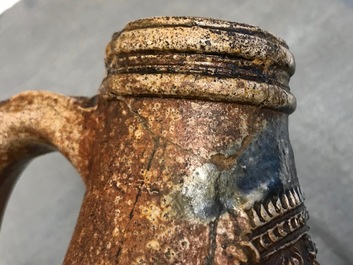 A large German stoneware Bellarmine jug with blue marriage seals, Frechen, 1st half 17th C.