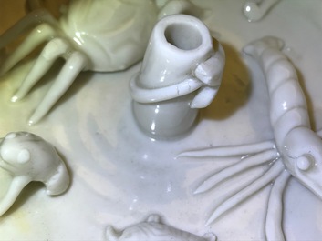 A Chinese Dehua blanc de Chine incense holder with aquatic animals, Kangxi