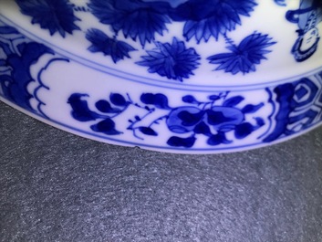 A Chinese blue and white klapmuts bowl with figural design, Kangxi mark and of the period