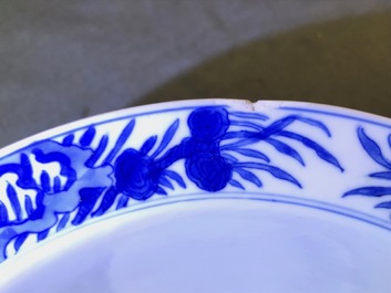 A Chinese blue and white klapmuts bowl with figural design, Kangxi mark and of the period