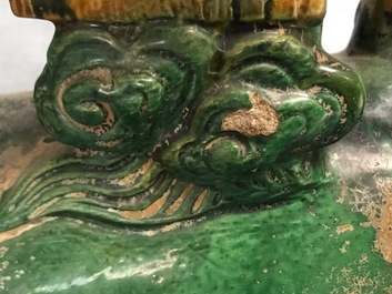 Two Chinese yellow and green-glazed 'horserider' roof tiles, Ming