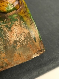 Two Chinese yellow and green-glazed 'horserider' roof tiles, Ming