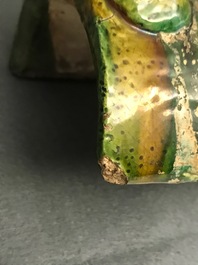 Two Chinese yellow and green-glazed 'horserider' roof tiles, Ming