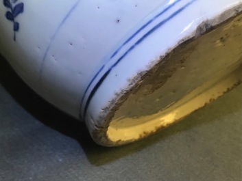 A Chinese blue and white jar with fruits and insects, Transitional period