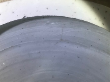 A Chinese blue and white jar with fruits and insects, Transitional period