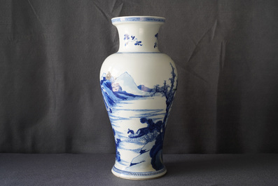 A Chinese blue and white 'river landscape' baluster vase with overglaze accents, Kangxi