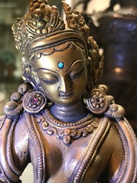 Een ingelegde verguld bronzen figuur van Vasudhara, Tibet of Nepal, 18/19e eeuw