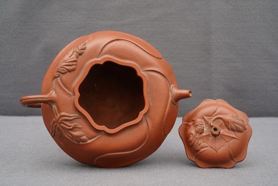 A Chinese Yixing stoneware flower-shaped teapot, Kangxi