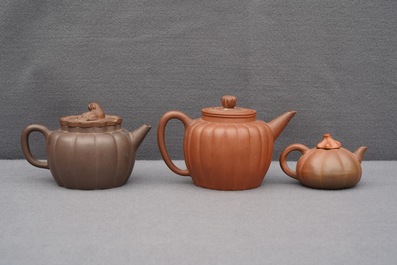 Six Chinese Yixing stoneware teapots and covers, 19th C.